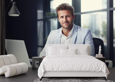 Man Working At Laptop In Contemporary Office Wall mural