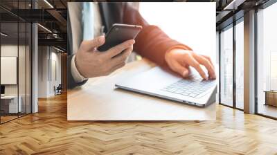 businessman working with laptop and phone Wall mural