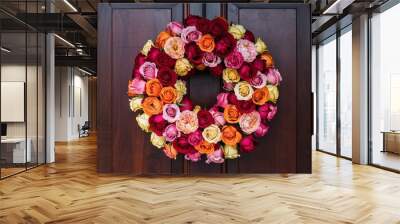 Valentine A colorful rose wreath hangs on a dark wooden door. (2) Wall mural