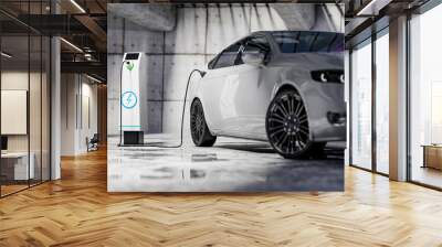 Charging an electric car with a public charger in a parking lot Wall mural