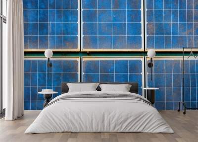 A blue solar panel with a lot of dirt on it Wall mural