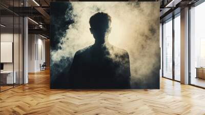 silhouette of a person and smoke around Wall mural