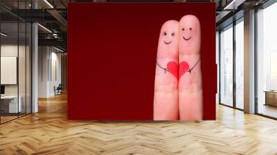 happy couple concept. two fingers in love with painted smiley Wall mural