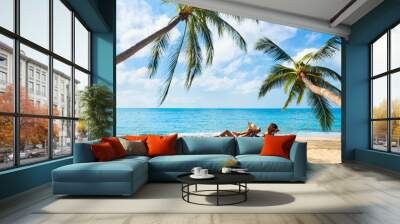 Couple relax on the beach enjoying beautiful sea on the tropical island Wall mural