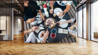 Enjoying meal with friends Wall mural