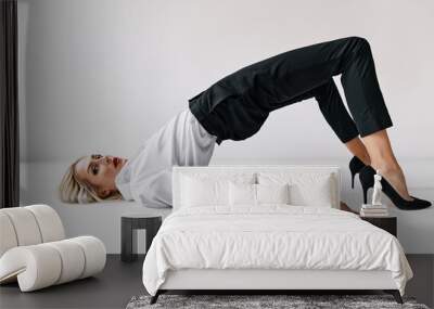 Style beautiful blonde woman posing on the floor Wall mural