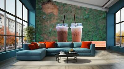 two glasses of iced coffee on the wooden table Wall mural