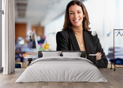 Confident businesswoman standing in a modern office and wearing business casual Wall mural