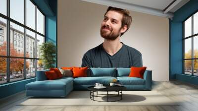 portrait of young man with beard, think about Wall mural