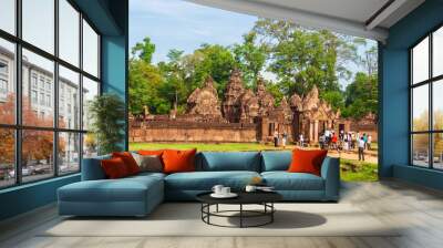 Tourists entering the east gopura of the second enclosure in the Banteay Srei (Citadel of the Women) temple. Taken in Siem Reap, Cambodia. Wall mural