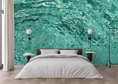 Green water waves in a swimming pool Wall mural