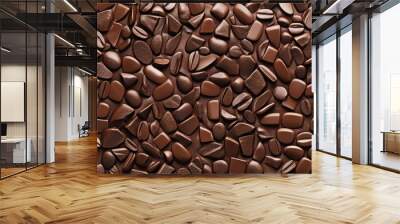 A close-up of various chocolate shapes and textures, creating a rich, indulgent visual. Wall mural