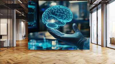 A hand holds a holographic brain, symbolizing neuroscience and advanced technology. Wall mural