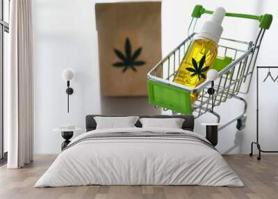 cart from the supermarket with bottle of hemp oil on Wall mural