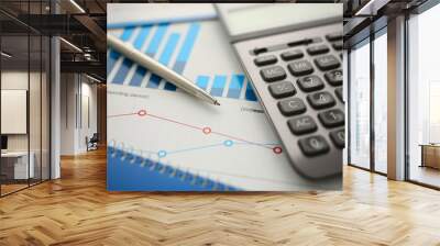 Silver calculator and financial statistics on clipboard pad at office table closeup. Internal Revenue Service inspector sum check irs investigation earnings savings loan and credit concept Wall mural