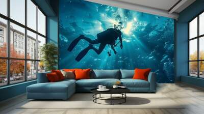 Scuba diver diving towards sun and boat on background underwater Wall mural