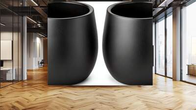 Two sleek black ceramic cups on a white background Wall mural