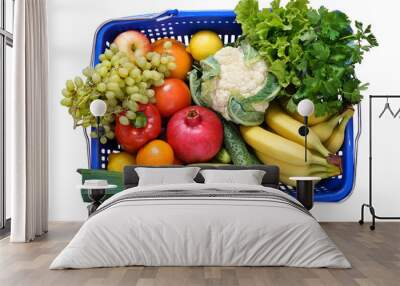 Blue basket with fruits and vegetables isolated on a transparent background Wall mural