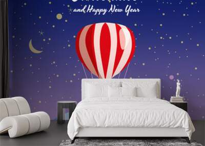 Santa Claus flying on hot air balloon Merry Christmas and Happy New Year Wall mural