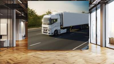 a white truck with a trailer drives along the highway against the backdrop of forest and mountains at sunset Wall mural