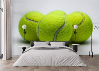 Three green tennis balls on a Dark white background high quality photo Wall mural