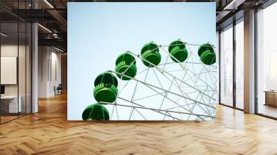 Ferris wheel against the blue sky Wall mural