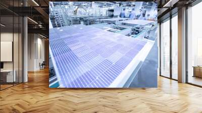 Solar panel manufacturing workshop, workers operate modern CNC machine tools. 4.0 in industry. Smart factory. Wall mural