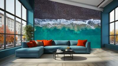 Aerial view of waves hitting the beach in Fecamp Normandy France Wall mural