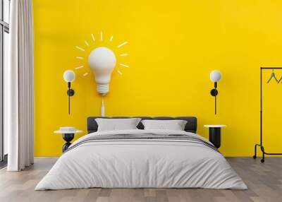 Business creativity and inspiration concepts with lightbulb and pencil on yellow background Wall mural