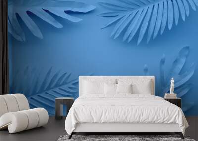 Collection of tropical leaves,foliage plant in blue color with space background Wall mural