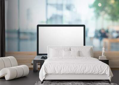 Modern computer,laptop with blank screen on counter bar(retail store shop)and window view Wall mural