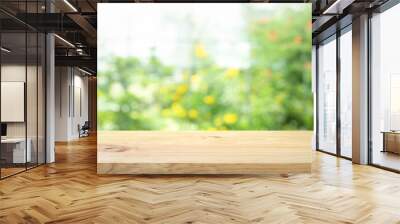 Real wood table top texture on blur flower garden background.For create product display or design key visual Wall mural