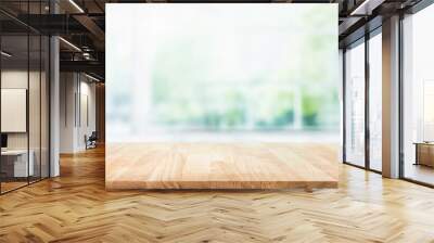 Selective focus.Empty of wood table top on blur of curtain with window and green from garden background.For montage product display or design key visual layout Wall mural