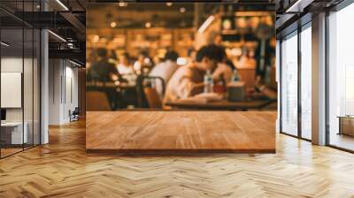 Wood table top with blur of people in coffee shop or (cafe,restaurant )background Wall mural