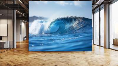 A large wave is crashing into the shore Wall mural