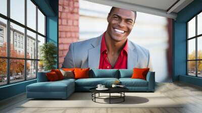 A man in a gray suit and red shirt is smiling Wall mural