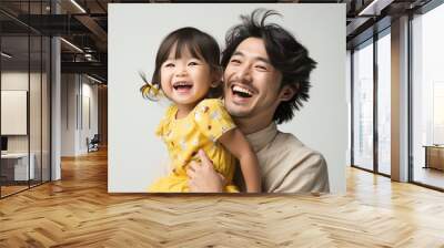 Handsome laughing dad playing and carrying his young daughter. created by generative AI technology. Wall mural