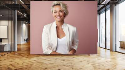 happy fashion smiling businesswoman CEO with bright suit in color background Wall mural