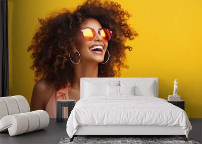 happy fashion smiling girl with bright clothing in solid light background Wall mural