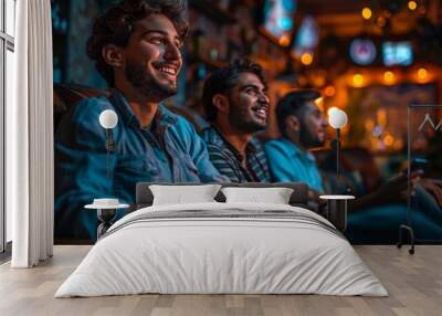 Three men are sitting on a couch, smiling and holding video game controllers Wall mural