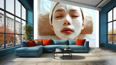 Woman Receiving Facial Treatment With Clay Mask At Spa Wall mural