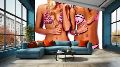 fashion portrait of smiling brunette and blond models in summer bright swimwear clothes on white background Wall mural