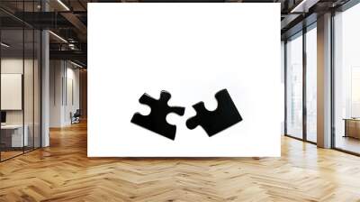 Two black puzzles on a white background. Puzzle for the development of intelligence. The concept of connection in the form of two plates of one whole. Association and connection symbol Wall mural