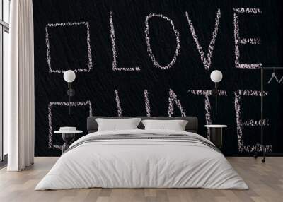 writing in chalk on a rough board or asphalt love hate with checkmark option. the concept of choosin Wall mural