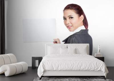 Asian businesswoman turn back show a blank sign Wall mural