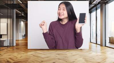 Happy Young Asian woman with mobile phone. Wall mural