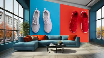 A studio shot of running shoes on bright color background. Flat lay. Wall mural