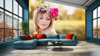 Beautiful woman with flower wreath. Wall mural