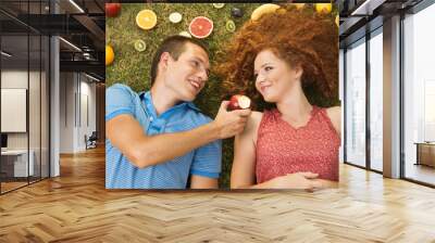 Couple with fruit Wall mural