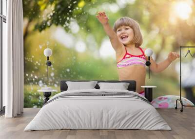 cute little girl having fun outside Wall mural